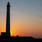 ...il faro ormai avvolto dal rosso sole calante ci saluta